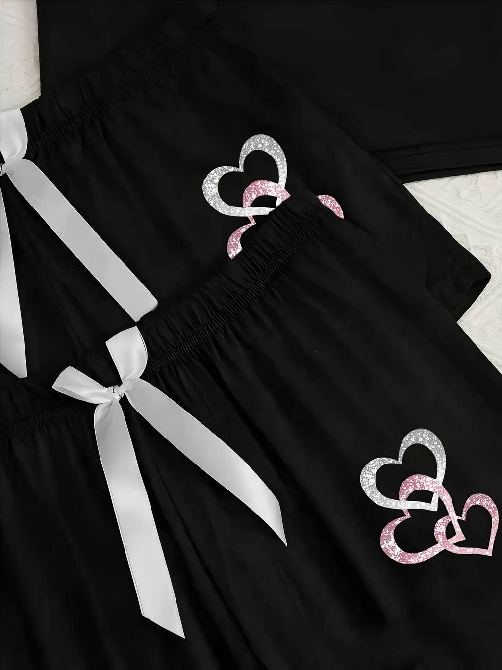3pcs Women's pajama set with sparkling heart print, featuring a casual round-neck short-sleeve top and long pants, sweet patterned design, suitable for multiple seasons